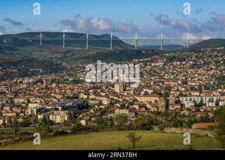 France, Aveyron, Grands Causses regional natural park, Millau city and the Millau viaduct by architects Michel Virlogeux and Norman Foster in the background Stock Photo