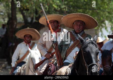 (150411) -- MORELOS,  -- People attend an event in commemoration of the 96th aniversary of Emiliano Zapata s murder, at the community of San Miguel Ixtilco el Grande, in Morelos State, Mexico, on April 10, 2015. Emiliano Zapata was one of the major leaders of the Mexican Revolution. Retana) (rhj) MEXICO-MORELOS-SOCIETY-COMMEMORATION MARGARITOxPEREZ PUBLICATIONxNOTxINxCHN   Morelos Celebrities attend to Event in Commemoration of The 96th Aniversary of Emiliano Zapata S Murder AT The Community of San Miguel  El Grande in Morelos State Mexico ON April 10 2015 Emiliano Zapata what One of The Major Stock Photo