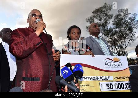 DURBAN, April 18, 2015 -- South Africa s President Jacob Zuma (L) speaks at a camp for displaced foreigners in Chatsworth of Durban, South Africa, on April 18, 2015. President Jacob Zuma said here on Saturday that his country is not driving foreigners away after days of violence against foreigners in parts of the country. DOC/)(bxq) SOUTH AFRICA-DURBAN-PRESIDENT-ANTI-XENOPHOBIA ElmondxJiyane PUBLICATIONxNOTxINxCHN   Durban April 18 2015 South Africa S President Jacob Zuma l Speaks AT a Camp for Displaced foreigners in Chatsworth of Durban South Africa ON April 18 2015 President Jacob Zuma Said Stock Photo