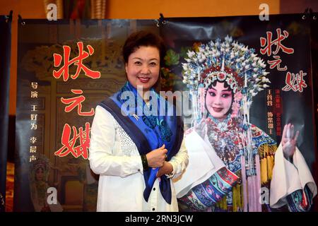 (150419) -- BEIJING, April 19, 2015 -- Wang Rongrong, leading actress of Peking Opeara film The Pearl Shirt , poses for photo with the film s poster during the fifth Beijing International Film Festival (BJIFF) in Beijing, capital of China, April 19, 2015. The fifth BJIFF specially sets up a section for classical Peking Opera Films in response to the 110th anniversary of the first Chinese film -- Peking Opera Mount Ding Jun . ) (mt) CHINA-BEIJING-FILM FESTIVAL-PEKING OPERA FILM-FORUM (CN) JinxLiangkuai PUBLICATIONxNOTxINxCHN   Beijing April 19 2015 Wang Rongrong Leading actress of Beijing  Film Stock Photo
