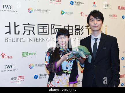 (150419) -- BEIJING, April 19, 2015 -- Leading actor Hiroki Hasegawa and leading actress Aso Kumiko of Peace & Love pose for photo at a press conference of the movie during the fifth Beijing International Film Festival (BJIFF) in Beijing, capital of China, April 19, 2015. Peace & Love has been nominated for the Tiantan Award of BJIFF. ) (yxb) CHINA-BEIJING-FILM FESTIVAL-TIANTAN AWARD-MAIN COMPETITION (CN) LuoxXiaoguang PUBLICATIONxNOTxINxCHN   Beijing April 19 2015 Leading Actor  Hasegawa and Leading actress Aso Kumiko of Peace & Love Pose for Photo AT a Press Conference of The Movie during Th Stock Photo