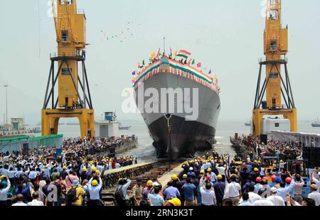 (150420) -- MUMBAI, April 20, 2015 -- India s new naval stealth destroyer Visakhapatnam sails into the Arabian Sea during its launch at Mazagon Dock in Mumbai, India, April 20, 2015. The new warship, Visakhapatnam, is named after a port city in the southern Indian state of Andhra Pradesh and it will be able to operate in nuclear, biological and chemical atmosphere, sources said. ) (zjy) INDIA-MUMBAI-NAVY-DESTROYER Stringer PUBLICATIONxNOTxINxCHN   Mumbai April 20 2015 India S New Naval STEALTH Destroyer  SAILS into The Arabian Sea during its Launch AT Mazagon Dock in Mumbai India April 20 2015 Stock Photo