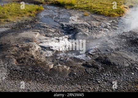 Close up of the Utu Geysir Geyser in Iceland, located at the Secret Lagoon hot spring near Fludir, Iceland Stock Photo