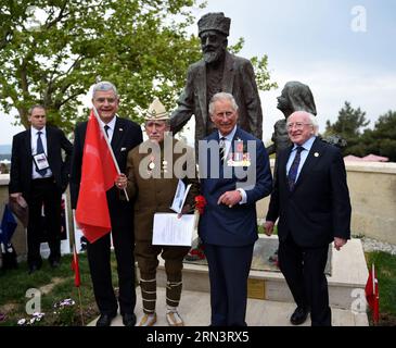 Irish President Michael D. Higgins(1st R), British Prince of Wales Charles(2nd R), Turkish Minister for EU Affairs Volkan Bozkir(4th R) and a Turkish veteran(3rd R) pose for a photo at the 57th Infantry Regiment Memorial in Canakkale, Turkey, April 25, 2015. Leaders and dignitaries from the UK, Ireland, Australia and New Zealand joined Turkish military delegates to attend Turkish memorial service on Saturday at the 57th Infantry Regiment Memorial, as an event of 100th anniversary of the Gallipoli Battle. ) TURKEY-CANAKKALE-TURKISH MEMORIAL SERVICE HexCanling PUBLICATIONxNOTxINxCHN   Irish Pres Stock Photo