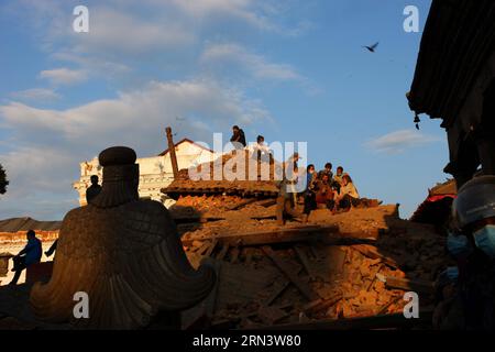 (150427) -- KATHMANDU, April 27, 2015 -- Rescuers rest at the remains of a fallen temple at Hanuman Dhoka Durbar Square after the massive earthquake in Kathmandu, Nepal, April 27, 2015. Death toll climbed to 3,815 following a massive 7.9-magnitude earthquake in Nepal Saturday, while 7,046 sustained injuries, says the country s ministry of foreign affairs Monday. ) NEPAL-KATHMANDU-EARTHQUAKE-AFTERMATH SunilxSharma PUBLICATIONxNOTxINxCHN   Kathmandu April 27 2015 Rescue Rest AT The Remains of a Fall Temple AT Hanuman Dhoka Durbar Square After The Massive Earthquake in Kathmandu Nepal April 27 20 Stock Photo