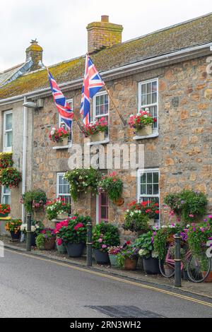 Union jack flag flying outside a house in Mount St. Michael, Cornwall. Stock Photo