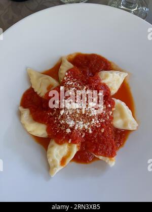 Culurgionis culurgiones, traditional Sardinian ravioli filled with potatoes, pecorino cheese and mint, typical Sardinian dish Stock Photo