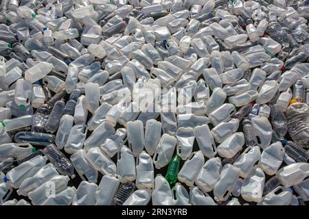 Plastic waste in floating on the surface of water pollution. Sea of plastic waste . Stock Photo