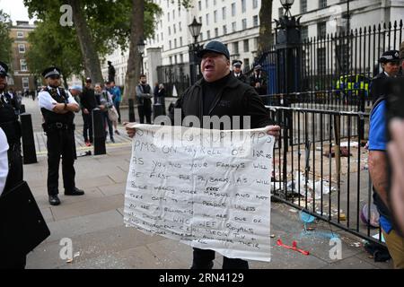 Downing Street, London, UK. 31st Aug, 2023. About 50 police officers cleared the protest area that had been set up outside Downing Street for a year. All the shelter's staff, table and chair, and three chickens have been loaded into a van. Credit: See Li/Picture Capital/Alamy Live News Stock Photo