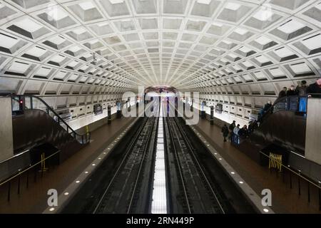 [Washington DC metro] subway DSC-RX100M5 | Focal Length (35mm equiv): 24 mm | Shutter speed:  ¹⁄₃₀ sec | Aperture: ƒ / 4.0 |  ISO 2500 | Exposure Bias: 0 EV Stock Photo