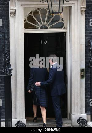 (150508) -- LONDON, May 8, 2015 -- British Prime Minister and leader of the Conservative Party David Cameron (R) returns to No. 10 Downing Street in London May 8, 2015. The Conservative Party remained the largest party at the House of Commons after the general election held on Thursday. ) (zcc) BRITAIN-GENERAL ELECTION-DAVID CAMERON HanxYan PUBLICATIONxNOTxINxCHN   150508 London May 8 2015 British Prime Ministers and Leader of The Conservative Party David Cameron r Returns to No 10 Downing Street in London May 8 2015 The Conservative Party remained The Largest Party AT The House of Commons Aft Stock Photo