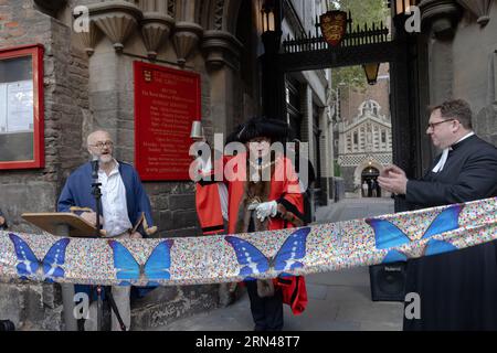 London, UK: Aug 30th 2023. The Lord Mayor of the City of London launched the revival of the historic Bartholomew Fair. The Fair was one of London's main events for 700 years and was last held in 1855 when it was banned for causing public disturbances.  The Lord Mayor Nicholas Lyons cut a special ribbon designed by artist Damien Hirst at London's oldest parish church St Bartholomew the Great to launch the Fair, which runs until September 16. Stock Photo