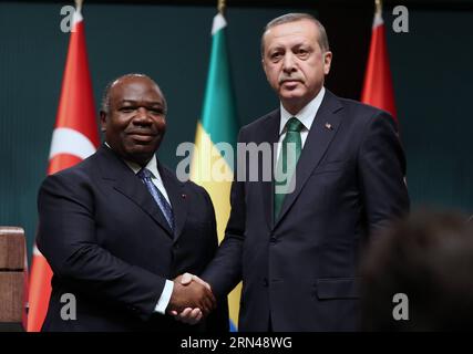 (150512) -- ANKARA, May 12, 2015, -- Turkish President Recep Tayyip Erdogan (R) and visiting Gabonese President Ali Bongo Ondimba shake hands as they attend a joint press conference in Ankara, Turkey, on May 12, 2015. Turkish President Recep Tayyip Erdogan on Tuesday strongly condemned an attack on a Turkish cargo ship off the Libyan coast, killing one person and wounding several other crew members. ) TURKEY-ANKARA-GABON-PRESS CONFERENCE-CARGO ATTACK MustafaxKaya PUBLICATIONxNOTxINxCHN   150512 Ankara May 12 2015 Turkish President Recep Tayyip Erdogan r and Visiting Gabonese President Ali Bong Stock Photo