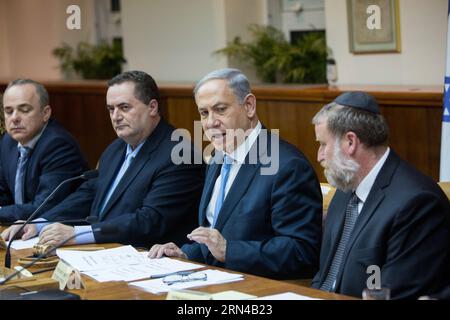 (150515) -- JERUSALEM, May 15, 2015 -- Israeli Prime Minister Benjamin Netanyahu (2nd R) addresses the first cabinet meeting of the Israel s 34th government at the Prime Minister s office in Jerusalem, on May 15, 2015. Israeli Prime Minister Benjamin Netanyahu s right-wing new coalition government was sworn in late Thursday night, after the parliament approved it by a razor-thin 61-59 majority. JINI/) (lrz) MIDEAST-JERUSALEM-ISRAEL-34TH GOV T-FIRST CABINET MEETING YonatanxSindel PUBLICATIONxNOTxINxCHN   Jerusalem May 15 2015 Israeli Prime Ministers Benjamin Netanyahu 2nd r addresses The First Stock Photo