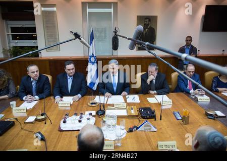 (150515) -- JERUSALEM, May 15, 2015 -- Israeli Prime Minister Benjamin Netanyahu (C) addresses the first cabinet meeting of the Israel s 34th government at the Prime Minister s office in Jerusalem, on May 15, 2015. Israeli Prime Minister Benjamin Netanyahu s right-wing new coalition government was sworn in late Thursday night, after the parliament approved it by a razor-thin 61-59 majority. /Yonatan Sindel) MIDEAST-JERUSALEM-ISRAEL-34TH GOV T-FIRST CABINET MEETING JINI PUBLICATIONxNOTxINxCHN   Jerusalem May 15 2015 Israeli Prime Ministers Benjamin Netanyahu C addresses The First Cabinet Meetin Stock Photo
