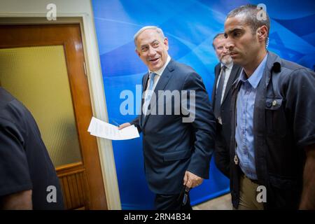 (150515) -- JERUSALEM, May 15, 2015 -- Israeli Prime Minister Benjamin Netanyahu (C) arrives for the first cabinet meeting of the Israel s 34th government at the Prime Minister s office in Jerusalem, on May 15, 2015. Israeli Prime Minister Benjamin Netanyahu s right-wing new coalition government was sworn in late Thursday night, after the parliament approved it by a razor-thin 61-59 majority. JINI/) (lrz) MIDEAST-JERUSALEM-ISRAEL-34TH GOV T-FIRST CABINET MEETING YonatanxSindel PUBLICATIONxNOTxINxCHN   Jerusalem May 15 2015 Israeli Prime Ministers Benjamin Netanyahu C arrives for The First Cabi Stock Photo