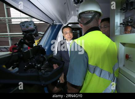 (150520) -- RIO DE JANEIRO, May 20, 2015 -- Chinese Premier Li Keqiang (L) talks to the driver as he takes a ride on a Chinese-made subway train for the Olympic special line in Rio De Janeiro, Brazil, May 20, 2015. ) (wyo) BRAZIL-RIO DE JANEIRO-CHINESE PREMIER-VISIT PangxXinglei PUBLICATIONxNOTxINxCHN   150520 Rio de Janeiro May 20 2015 Chinese Premier left Keqiang l Talks to The Driver As he Takes a Ride ON a Chinese Made Subway Train for The Olympic Special Line in Rio de Janeiro Brazil May 20 2015 wyo Brazil Rio de Janeiro Chinese Premier Visit PangxXinglei PUBLICATIONxNOTxINxCHN Stock Photo