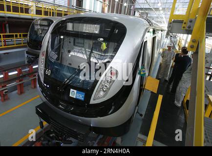 (150520) -- RIO DE JANEIRO, May 20, 2015 -- Photo taken on May 20, 2015 shows a Chinese-made subway train for the Olympic special line in Rio De Janeiro, Brazil. Chinese Premier Li Keqiang took a ride on the train May 20. ) (wyo) BRAZIL-RIO DE JANEIRO-CHINESE PREMIER-VISIT PangxXinglei PUBLICATIONxNOTxINxCHN   150520 Rio de Janeiro May 20 2015 Photo Taken ON May 20 2015 Shows a Chinese Made Subway Train for The Olympic Special Line in Rio de Janeiro Brazil Chinese Premier left Keqiang took a Ride ON The Train May 20 wyo Brazil Rio de Janeiro Chinese Premier Visit PangxXinglei PUBLICATIONxNOTxI Stock Photo