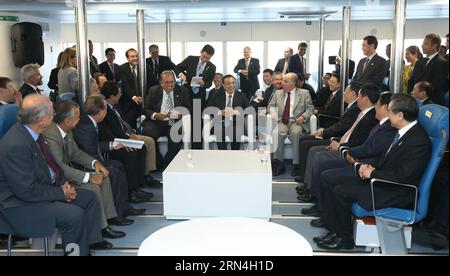 (150520) -- RIO DE JANEIRO, May 20, 2015 -- Chinese Premier Li Keqiang (C) talks with Chinese and Brazilian representatives from manufacturing and financial sectors as he takes a ride on a Chinese-made ferry boat in Rio De Janeiro, Brazil, May 20, 2015. ) (wyo) BRAZIL-RIO DE JANEIRO-CHINESE PREMIER-VISIT PangxXinglei PUBLICATIONxNOTxINxCHN   150520 Rio de Janeiro May 20 2015 Chinese Premier left Keqiang C Talks With Chinese and Brazilian Representatives from Manufacturing and Financial Sectors As he Takes a Ride ON a Chinese Made Ferry Boat in Rio de Janeiro Brazil May 20 2015 wyo Brazil Rio d Stock Photo