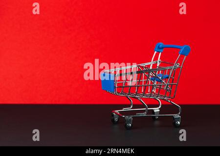 Toy empty shopping trolley Stock Photo