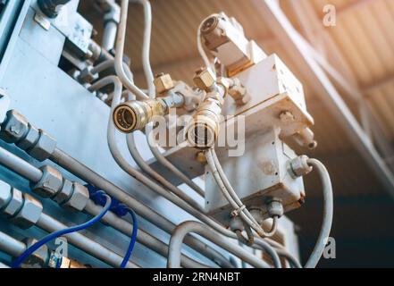 Pipe fittings for connecting high-pressure hoses in an industrial unit in a factory Stock Photo