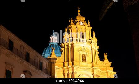 Night shot, cathedral illuminated, blue light on dome, Piazza Duomo, Duomo di San Giorgio, Ragusa Ibla, baroque city, baroque angle, southeast Stock Photo