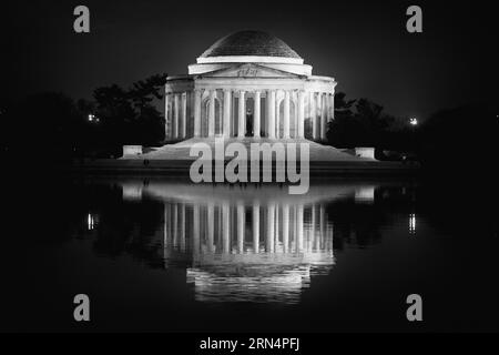 WASHINGTON DC, United States — A black and white photograph of the Jefferson Memorial. The Jefferson Memorial stands as an iconic tribute to the third U.S. President, Thomas Jefferson. Overlooking the Tidal Basin, this neoclassical monument is a testament to Jefferson's contributions to the founding principles of the nation. Stock Photo