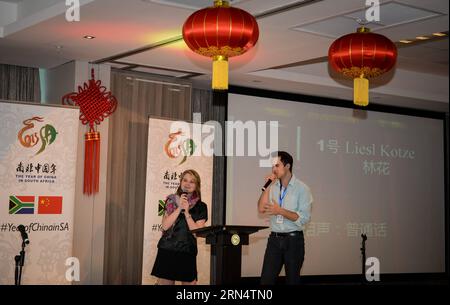 (150530) -- DURBAN, May 30, 2015 -- One of the first prize winners Liesl Kotze (L) performs Xiangsheng (Crosstalk) during the South African Preliminary Competition of the 14th Chinese Bridge Chinese Proficiency Competition for College Students, in Durban, South Africa, on May 30, 2015. South African qualification of 2015 Chinese Bridge -- Chinese Proficiency Competition for Foreign College Students was held here on Saturday. Two winners of 24 competitors will go to the final to be held in Hunan Province of China in July this year. ) SOUTH AFRICA-DURBAN-CHINESE BRIDGE-LANGUAGE COMPETITION Zhaix Stock Photo