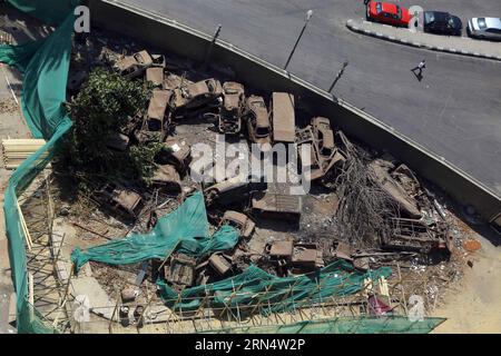 (150531) -- CAIRO, May 31, 2015 -- Abandoned cars are seen from top of the former ruling National Democratic Party (NDP) s headquarters in downtown Cairo, Egypt, on May 31, 2015. The demolition of the damaged headquarters of NDP, which was a symbol of the Revolution in 2011, ousting Egypt s former President Hosni Mubarak, started on Sunday. ) EGYPT-CAIRO-NDP-BUILDING-DEMOLITION AhmedxGomaa PUBLICATIONxNOTxINxCHN   150531 Cairo May 31 2015 Abandoned Cars are Lakes from Top of The Former ruling National Democratic Party NDP S Headquarters in Downtown Cairo Egypt ON May 31 2015 The Demolition of Stock Photo