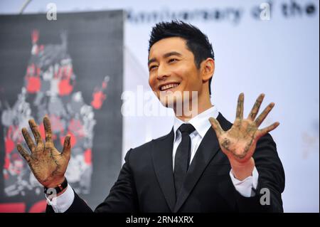 (150603) -- LOS ANGELES, June 3, 2015 -- Chinese actor Huang Xiaoming attends a Handprints ceremony in the forecourt of TCL Chinese Theatre in Los Angeles, the United States, June 3, 2015. A Handprints ceremony was held here for director Justin Lin, movie stars Zhao Wei and Huang Xiaoming on Wednesday. ) U.S.-LOS ANGELES-HANDPRINT CEREMONY ZhangxChaoqun PUBLICATIONxNOTxINxCHN   150603 Los Angeles June 3 2015 Chinese Actor Huang Xiao Ming Attends a handprints Ceremony in The forecourt  of TCL Chinese Theatre in Los Angeles The United States June 3 2015 a handprints Ceremony what Hero Here for D Stock Photo