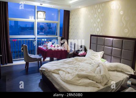 (150606) -- CHONGQING, June 6, 2015 -- A student prepares for the coming national college entrance exams at a room of a hotel in Bishan District of Chongqing, southwest China, June 6, 2015, one day before the exams. About 1300 students of Laifeng High School would attend the exam in Bishan District, a site 20 kilometers away from their school, on June 7 and 8, therefore, most of the students booked hotels near the exam site and prepared for the exam at the last night. ) (zkr) CHINA-CHONGQING-COLLEGE ENTRANCE EXAM-PREPARATION(CN) LiuxChan PUBLICATIONxNOTxINxCHN   Chongqing June 6 2015 a Student Stock Photo