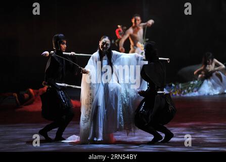 (150613) -- BEIJING, June 12, 2015 -- Actors of the Beijing Modern Dance Company (BMDC) perform in a theatre in Beijing, capital of China, June 12, 2015. The BMDC gave a performance here on Friday marking the 20th anniversary of its founding. ) (zwx) CHINA-BEIJING-BMDC-PERFORMANCE (CN) LixYan PUBLICATIONxNOTxINxCHN   Beijing June 12 2015 Actors of The Beijing Modern Dance Company  perform in a Theatre in Beijing Capital of China June 12 2015 The  Gave a Performance Here ON Friday marking The 20th Anniversary of its Founding zwx China Beijing  Performance CN LixYan PUBLICATIONxNOTxINxCHN Stock Photo