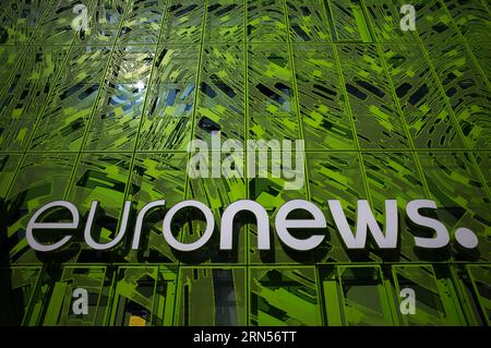 Euronews lettering, Le Cube Verte, green cube, headquarters of the TV channel euronews, modern architecture in the La Confluence district, Lyon Stock Photo