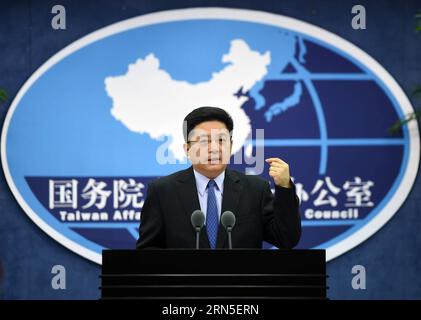 (150624) -- BEIJING, June 24, 2015 -- Ma Xiaoguang, spokesman for the State Council Taiwan Affairs Office, speaks at a press conference in Beijing, capital of China, June 24, 2015. The Chinese mainland welcomes people from all walks of life in Taiwan, including veterans who fought the war and their relatives, to attend the mainland s commemoration of the 70th anniversary of the end of World War II. Ma Xiaoguang, spokesman for the State Council Taiwan Affairs Office, told the press conference that the victory in the Chinese People s War of Resistance against Japanese Aggression was owned by the Stock Photo