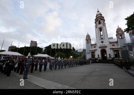 (150624) -- CARACAS, June 24, 2015 -- People take part in the raising ceremony of Venezuelan national flag as part of the commemoration events for the 194th anniversary of the Battle of Carabobo, a key event in the nation s independence from Spain, at the National Pantheon in Caracas, Venezuela, on June 24, 2015. Gabriel Lara/) (fnc) VENEZUELA-CARACAS-MILITARY-COMMEMORATION AVN PUBLICATIONxNOTxINxCHN   150624 Caracas June 24 2015 Celebrities Take Part in The Raising Ceremony of Venezuelan National Flag As Part of The Commemoration Events for The 194th Anniversary of The Battle of Carabobo a Ke Stock Photo