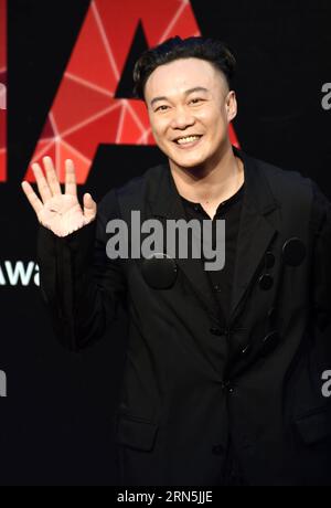 (150627) -- TAIPEI, June 27, 2015 -- Singer Eason Chan poses on the red carpet as he arrives for the 26th Golden Melody Awards in Taipei, southeast China s Taiwan, June 27, 2015. ) (mp) CHINA-TAIPEI-GOLDEN MELODY AWARDS (CN) WuxChing-teng PUBLICATIONxNOTxINxCHN   150627 Taipei June 27 2015 Singer Eason Chan Poses ON The Red Carpet As he arrives for The 26th Golden MELODY Awards in Taipei South East China S TAIWAN June 27 2015 MP China Taipei Golden MELODY Awards CN WuxChing Teng PUBLICATIONxNOTxINxCHN Stock Photo