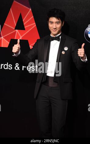 (150627) -- TAIPEI, June 27, 2015 -- Singer Leehom Wang poses on the red carpet as he arrives for the 26th Golden Melody Awards in Taipei, southeast China s Taiwan, June 27, 2015. ) (mp) CHINA-TAIPEI-GOLDEN MELODY AWARDS (CN) WuxChing-teng PUBLICATIONxNOTxINxCHN   150627 Taipei June 27 2015 Singer Leehom Wang Poses ON The Red Carpet As he arrives for The 26th Golden MELODY Awards in Taipei South East China S TAIWAN June 27 2015 MP China Taipei Golden MELODY Awards CN WuxChing Teng PUBLICATIONxNOTxINxCHN Stock Photo