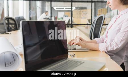 Businesswoman working with laptop office Stock Photo