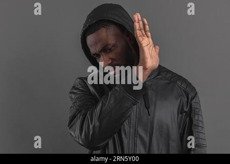 Man looking down holding hand air Stock Photo