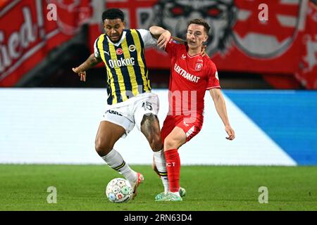 ENSCHEDE - (lr) Joshua King of Fenerbahce SK, Daan Rots of FC Twente during the UEFA Conference League play-offs match between FC Twente and Fenerbahce SK at Stadion De Grolsch Veste on August 31, 2023 in Enschede, Netherlands. AP | Dutch Height | GERRIT OF COLOGNE Stock Photo