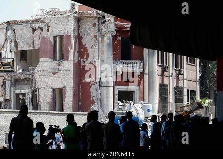 (150711) -- CAIRO, July 11, 2015 -- Investigators work at the explosion site outside Italian Consulate in downtown Cairo, capital of Egypt, on July 11, 2015. A powerful explosion occurred in front of Italian Consulate in downtown Cairo Saturday, killing one person and injuring seven, according to Egypt s Health Ministry. ) EGYPT-CAIRO-ITALIAN CONSULATE-EXPLOSION CuixXinyu PUBLICATIONxNOTxINxCHN   150 711 Cairo July 11 2015 Investigators Work AT The Explosion Site outside Italian consulate in Downtown Cairo Capital of Egypt ON July 11 2015 a Powerful Explosion occurred in Front of Italian consu Stock Photo