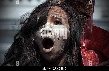 (150719) -- QUITO, July 18, 2015 -- A member of the dance group Bastards Children of Butoh perform during a demonstration in memory of missing people in Theatre Square, in Quito, Ecuador, on July 18, 2015. According to the State Attorney General, from Jan. 2013 to Dec. 2014, a total of 1,606 people have been reported missing in Ecuador. Santiago Armas) ECUADOR-QUITO-SOCIETY-DEMONSTRATION e SANTIAGOxARMAS PUBLICATIONxNOTxINxCHN   150719 Quito July 18 2015 a member of The Dance Group Bastards Children of Butoh perform during a Demonstration in Memory of Missing Celebrities in Theatre Square in Q Stock Photo