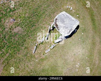 Aerial zenithal view of a dolmen, a prehistoric tomb, ancient burial Stock Photo