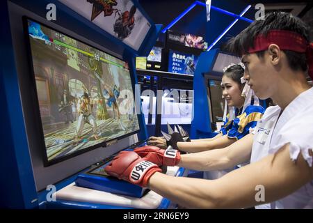 (150723) -- HONG KONG, July 23, 2015 -- Cosplayers play games during the 17th Ani-Com & Games Hong Kong at Hong Kong Convention and Exhibition Center, south China s Hong Kong, July 23, 2015. The event will last from July 24 to 28. ) (mp) CHINA-HONG KONG-ANI-COM & GAMES (CN) HexJingjia PUBLICATIONxNOTxINxCHN   150723 Hong Kong July 23 2015 Cosplayers Play Games during The 17th Ani Com & Games Hong Kong AT Hong Kong Convention and Exhibition Center South China S Hong Kong July 23 2015 The Event will Load from July 24 to 28 MP China Hong Kong Ani Com & Games CN HexJingjia PUBLICATIONxNOTxINxCHN Stock Photo