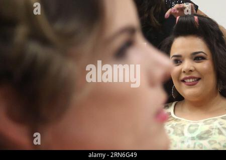 Models react in the backstage during the runway show of the summer collection of the 12th Fashion Weekend Plus Size, in Sao Paulo, Brazil, on July 25, 2015. Rahel Patrasso) (bxq) BRAZIL-SAO PAULO-FASHION-SHOW e RahelxPatrasso PUBLICATIONxNOTxINxCHN   Models react in The Backstage days during The Runway Show of The Summer Collection of The 12th Fashion Weekend Plus Size in Sao Paulo Brazil ON July 25 2015 Rahel Patrasso bxq Brazil Sao Paulo Fashion Show e RahelxPatrasso PUBLICATIONxNOTxINxCHN Stock Photo