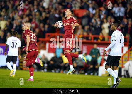 Aberdeen's Bojan Miovski celebrates scoring their side's first goal of the game from the penalty spot during the UEFA Europa League play-off second leg match at Pittodrie Stadium, Aberdeen. Picture date: Thursday August 31, 2023. Stock Photo