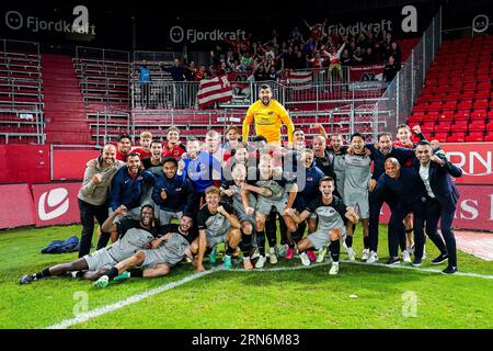 BERGEN - Players of AZ celebrate victory during the UEFA Conference League play-offs match between SK Brann and AZ Alkmaar at Brann stadium on August 31, 2023 in Bergen, Norway. ANP ED VAN DE POL Stock Photo