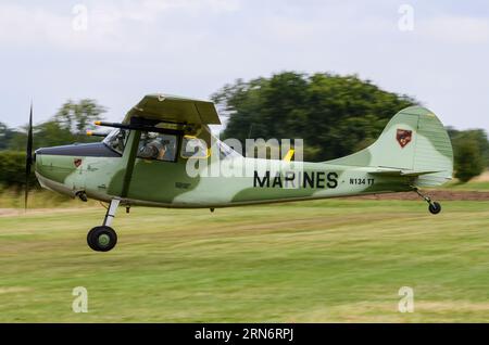 Cessna O-1E Bird Dog, was a liaison and observation aircraft that served with U.S. military in Vietnam. Landing at Little Gransden, UK Stock Photo