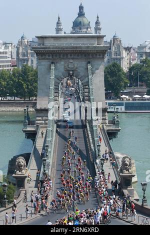 (150810) -- BUDAPEST,  - Participants of the Tour de Hongrie multiple stage bicycle race cross a bridge in downtown Budapest, Hungary, Aug. 9, 2015. Tour de Hongrie is a traditional bicycle tour race around Hungary. Participants started in Szombathely on Aug. 4 and finished on Aug. 9 in Budapest. Total length of the course is 700 km completed by 75 of the 96 participants during six days. ) (SP)HUNGARY-BUDAPEST-BICYCLE RACE CsabaxDomotor PUBLICATIONxNOTxINxCHN   150810 Budapest Participants of The Tour de Hongrie Multiple Stage BICYCLE Race Cross a Bridge in Downtown Budapest Hungary Aug 9 2015 Stock Photo