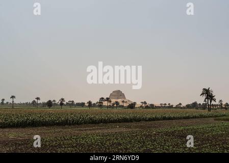 Photo taken on Aug. 10, 2015 shows the outlook of Meidum Pyramid in Beni Suef Governorate, about 100 kilometers south to Cairo, Egypt. Meidum Pyramid is thought to be built by the Pharaoh Sneferu, who continued his father Huni s work around 4,600 years ago. ) EGYPT-BENI SUEF-MEIDUM PYRAMID PanxChaoyue PUBLICATIONxNOTxINxCHN   Photo Taken ON Aug 10 2015 Shows The Outlook of Meidum Pyramid in Beni Suef Governorate About 100 Kilometers South to Cairo Egypt Meidum Pyramid IS Thought to Be built by The Pharaoh Sneferu Who Continued His Father Huni S Work Around 4 600 Years Ago Egypt Beni Suef Meidu Stock Photo